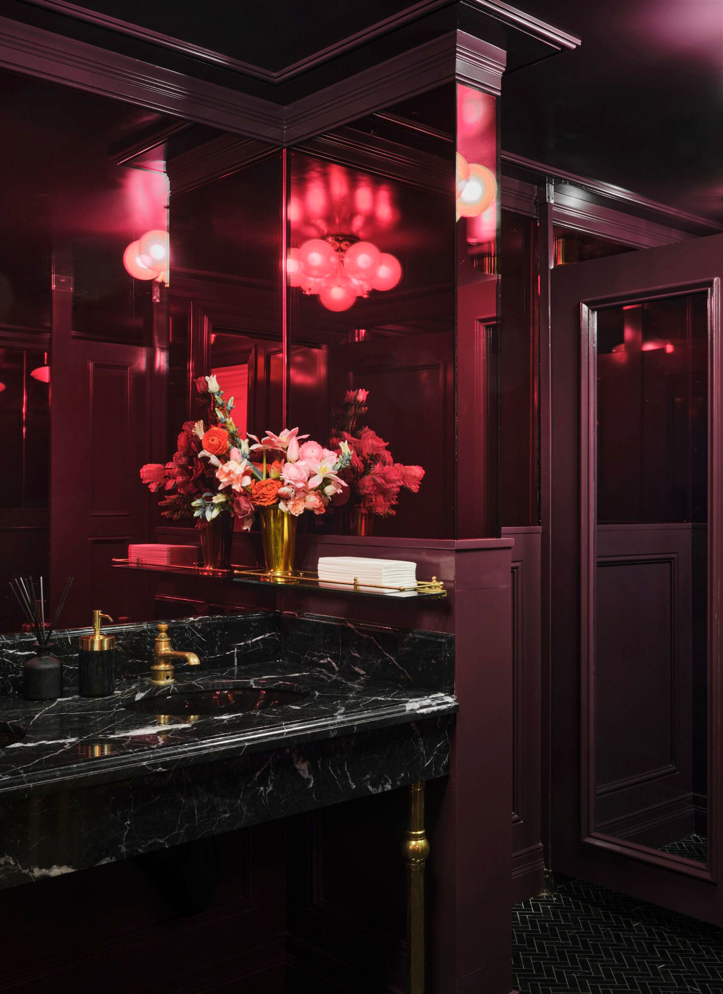 Custom purple and gold glass in the Dirty French bathroom
